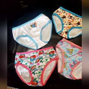 DISNEY four pack of new underwear for girls.